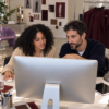 A B2B buyer using an AI assistant in a webshop to find products by material, color, and intended use.