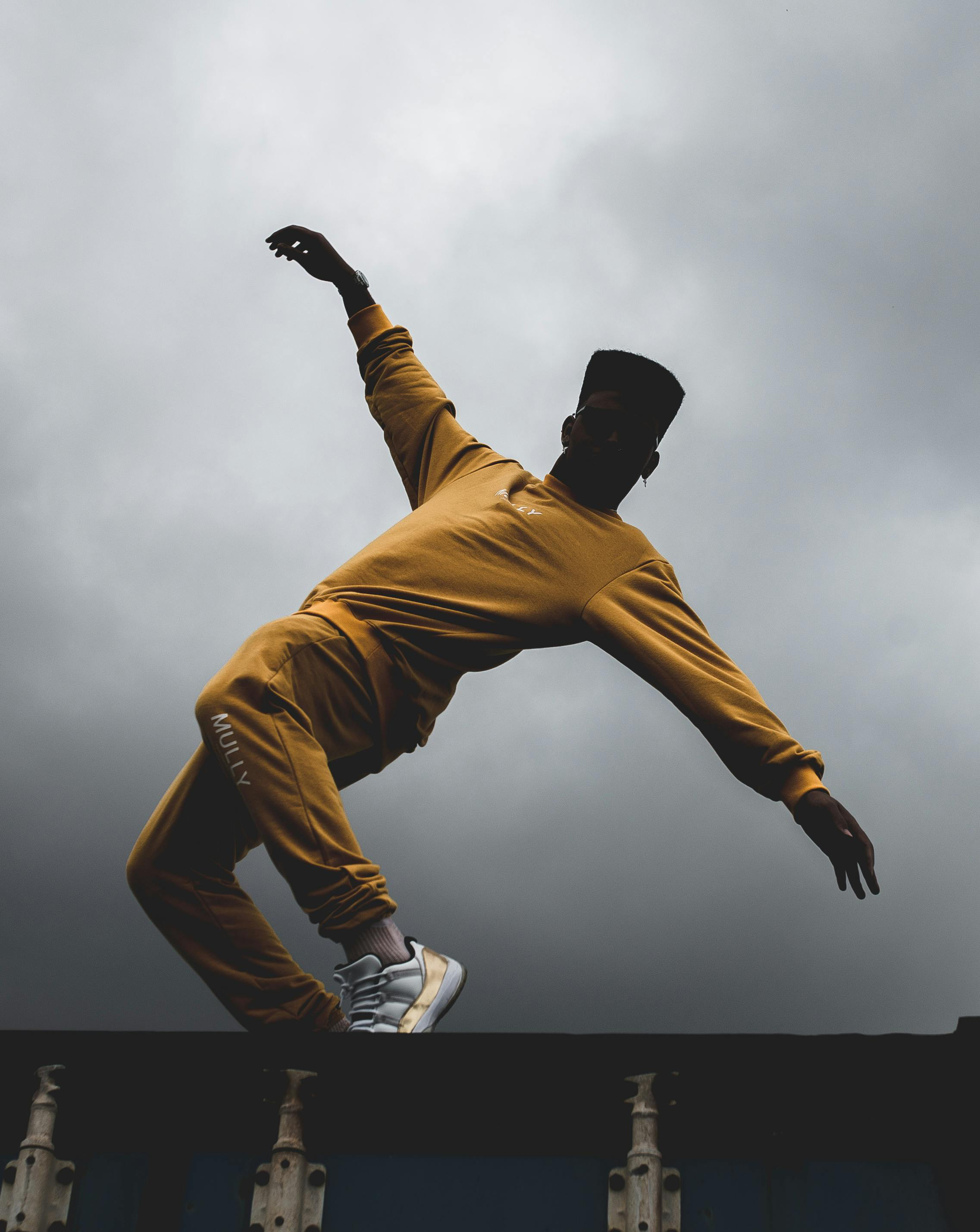 Man dancing on rooftop